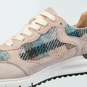 Close-up of Islander Rosie trainer showing Harris Tweed panel and blush pink suede details.