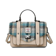 Islander Tartan Harris Tweed Satchel with a cream coloured PU leather body and shoulder strap behind.