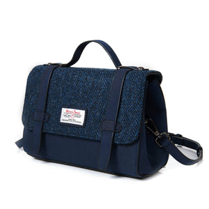 Harris Tweed satchel handbag in navy blue leather with a dark blue herringbone design.
