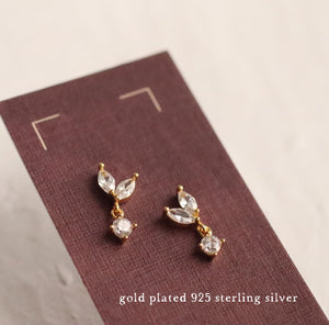 Gold-plated sterling silver Japanese Petal Stud Earrings displayed on a jewellery card.