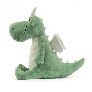 A side view of Jellycat Adon Dragon with his legs stretched out in front and tail behind. 