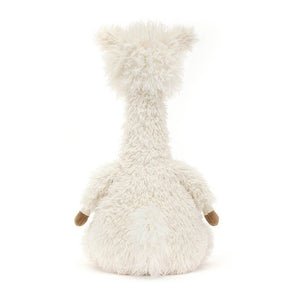 From behind Jellycat Alonso Alpaca children's stuffed animal showing his creamy white fur.