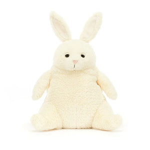 Front-facing: Adorable Jellycat Amore Bunny with vanilla fur, perky ears, carrot arms, and a sweet expression, perfect for cuddles and playtime.