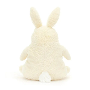 Back view: Playful Jellycat Amore Bunny from behind, highlighting its fluffy tail, perky ears, and calming presence, a perfect companion for naps and bedtime snuggles.