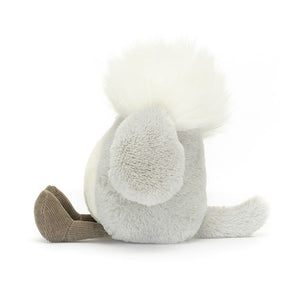 Playful Jellycat Amuseabean Sheepdog in profile, highlighting its fluffy tail, floppy ears, and irresistible personality, making it a delightful companion for all ages (except toddlers).