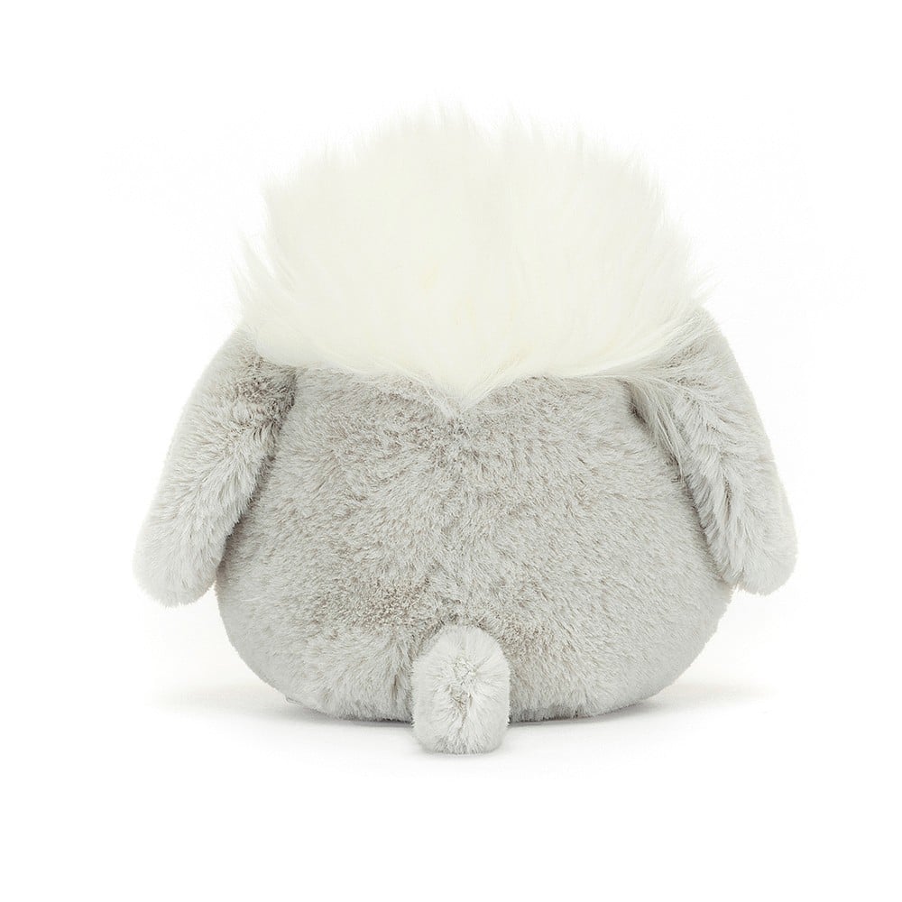 Cheeky Jellycat Amuseabean Sheepdog from behind, displaying its silver-grey fur, corduroy boots, and signature tufty hairdo, ready to spread joy and fun from any angle.