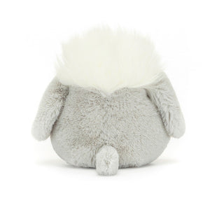 Cheeky Jellycat Amuseabean Sheepdog from behind, displaying its silver-grey fur, corduroy boots, and signature tufty hairdo, ready to spread joy and fun from any angle.