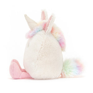 From the side the Jellycat Amuseabean Unicorn with the rainbow coloured main and tail on show. 