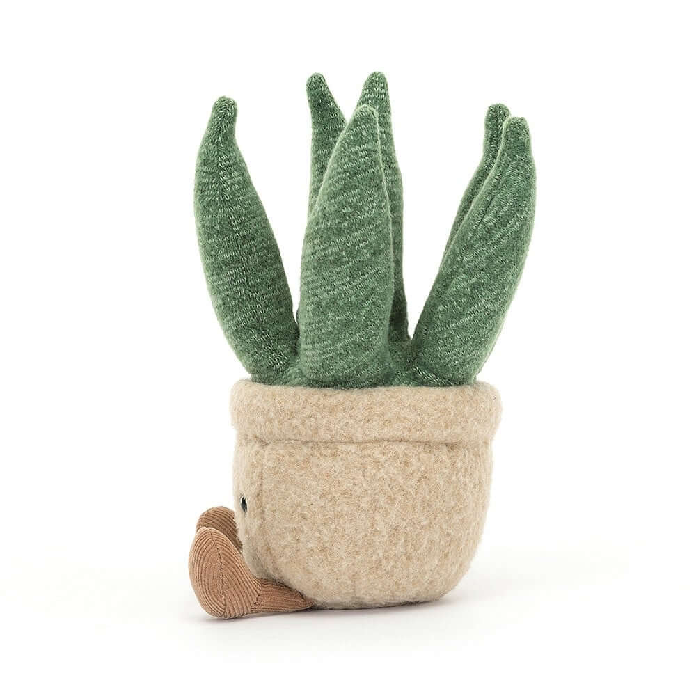 Punny and charming Jellycat Amuseable Aloe Vera Small plush in profile, highlighting its fluffy "succulent" arms, cute beanie base, and toffee cord boots, resting in a round felt biscuit pot.