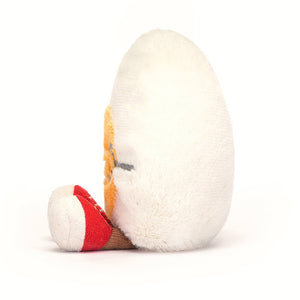 Cuddly Jellycat Egg Geek plush seen from the side, highlighting its charmingly plump shape and embroidered details.