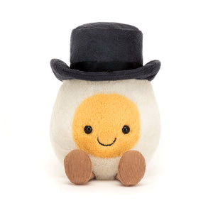 Front View: Debonair Jellycat Amuseable Boiled Egg Groom plush with sunny yellow yolk, dapper top hat, and bow tie. Perfect for wedding day cuddles.