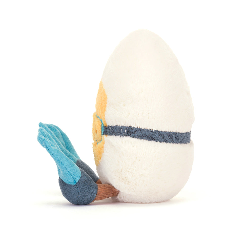 Side View: Bath time buddy? The Jellycat Amuseable Boiled Egg Scuba is ready to explore with its bright blue mask, flippers, and cheerful expression!