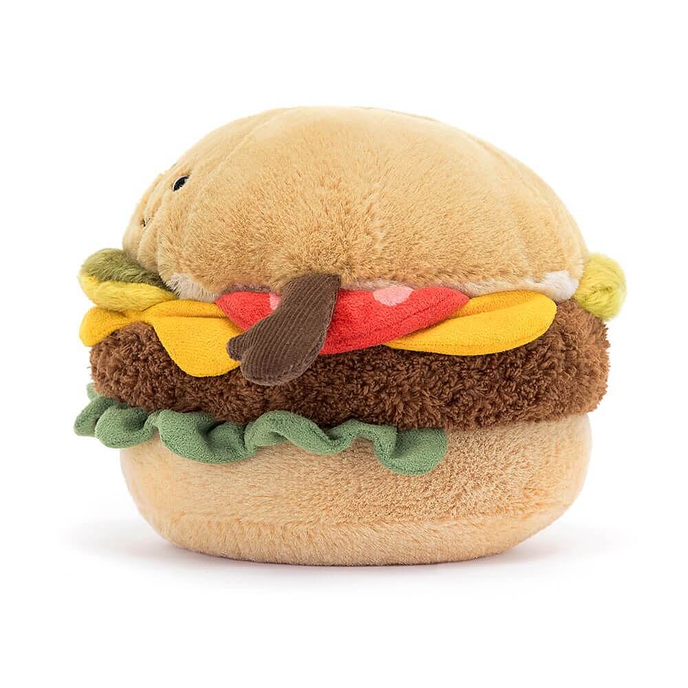 From the side the Jellycat Amuseable Burger children's soft toy with little corduroy arms.