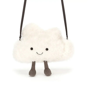 A close-up of the Jellycat Amuseable Cloud Bag's soft white plush and corduroy legs.