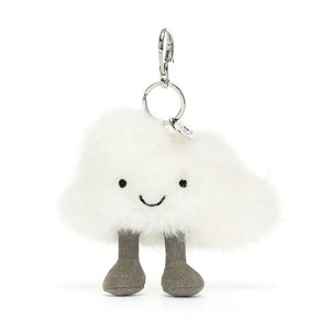 A fluffy white cloud bag charm with a cute face and cordy legs,