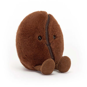 A close-up photo of the Jellycat Amuseable Coffee Bean's realistic stitching details and rich espresso-colored fur.