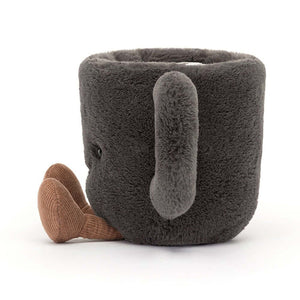Cozy Jellycat Coffee Cup plush in profile, revealing its soft plush texture, corduroy boots, and cute embroidered details.