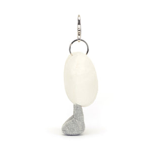 Side View: Cuddles for your bag! The Jellycat Cream Heart Bag Charm with its soft plush texture and secure clasp.