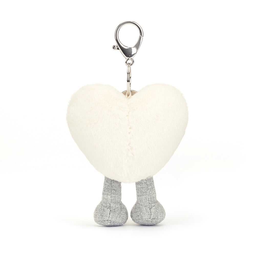 Back View: Add a touch of whimsy! The Jellycat Cream Heart Bag Charm, a delightful way to personalize your bag with a touch of love.