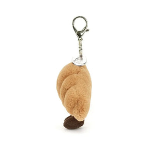 Side view of the Jellycat Croissant Bag Charm.