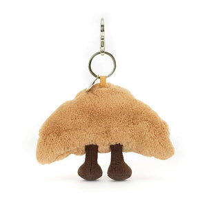 Back of the Jellycat Amuseable Croissant Bag Charm.