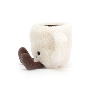 Side view of the Jellycat Amuseable Espresso Cup highlights its soft curves, rich coffee filling, and playful cordy legs. A delightful plush friend for on-the-go adventures.