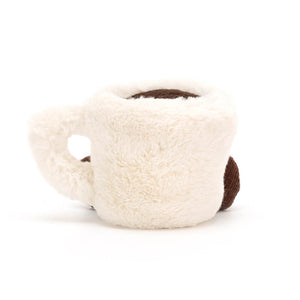 Back view of the Jellycat Amuseable Espresso Cup, featuring its soft cream plush, charming details, and playful cordy legs. A huggable friend for all.