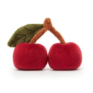 From behind the Jellycat Amuseable Fabulous Fruit Cherry children's soft toy.