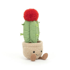 Playful plush Moon Cactus shows off fluffy red crown, grid-patterned stem, and super-soft ribbon "spikes" on a cozy oat felt pot. Perfect for all ages!