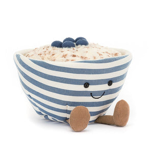  Delightful Jellycat Amuseable Oats plush toy, striped bowl tilted playfully, brimming with oatmeal and blueberries. Super soft and cuddly, perfect for imaginative play.