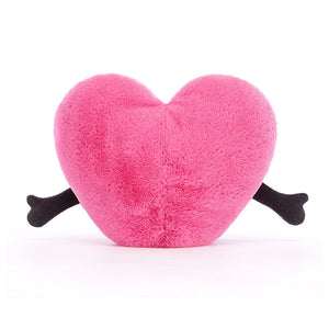 A rear view of the Jellycat Amuseable Pink Heart, with the little corded arms stretched to the sides.