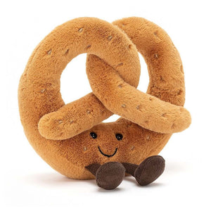 Freckled and friendly, the Jellycat Amuseable Pretzel is a golden brown plush toy with cocoa cord boots and stitchy salt speckles. Perfect for cuddles and playtime!