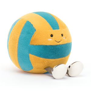 Jellycat Amuseables Sports Beach Volley at an angle, showcasing its soft fur, embroidered face ready for a bump, and playful corded legs with sandals digging into the "sand."