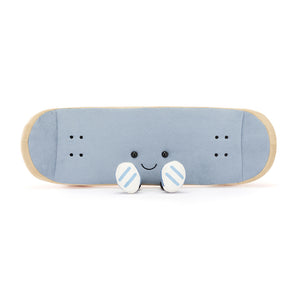 Adorable Jellycat Amuseables Sports Skateboarding facing front, highlighting its embroidered facial features, skateboard shape and the soles of the little boots.