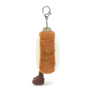 Side view of the bag charm showing the thickness of the toast. 