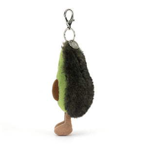 Side view of Jellycat Amuseables Avocado Bag Charm showing its fluffy avocado shape and sturdy clasp.