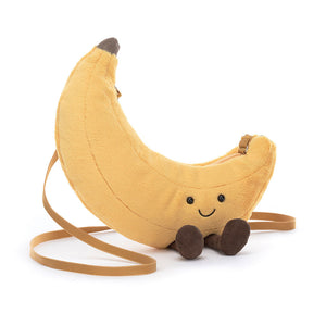 Close-up view of the Jellycat Amuseables Banana Bag plush toy, highlighting its soft, cuddly texture and zipper closure.