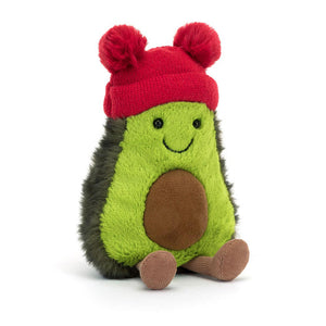 Front View: A soft, plush avocado toy with a green body, brown pit, and a cute bobble on top.
