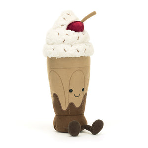 Front view of Jellycat Amuseables Chocolate Milkshake plush with a smiling face, whipped cream topping, and a striped straw.