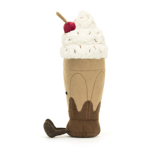 Side view of the plush chocolate milkshake, showing its velvety cup and corduroy legs.