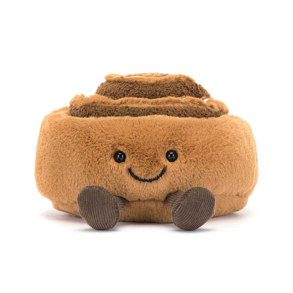 Front view of Jellycat Amuseables Cinnamon Bun plush with smiling face and corduroy feet.