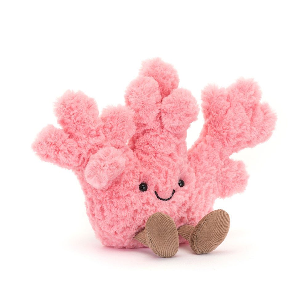 Front view: Jellycat Amuseables Coral plush with pink fuzzy branches and smiling face.