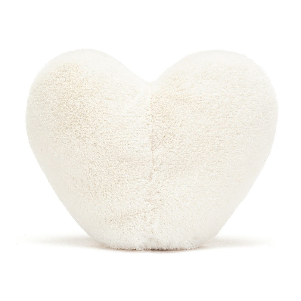 From behind the Jellycat Amuseables Cream Heart children's soft toy.