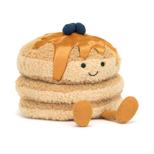 Front view of Jellycat Amuseables Fran Pancakes plush with a happy face, syrup drizzle, and blueberries.