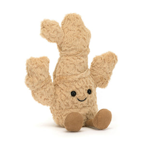 Angled View: Spice up playtime! The Jellycat Amuseables Ginger sits tilted, showcasing its stunning golden fur with chunky textures, cheery embroidered grin, and toffee cord boots. A fun and fiery addition to your plushie collection!