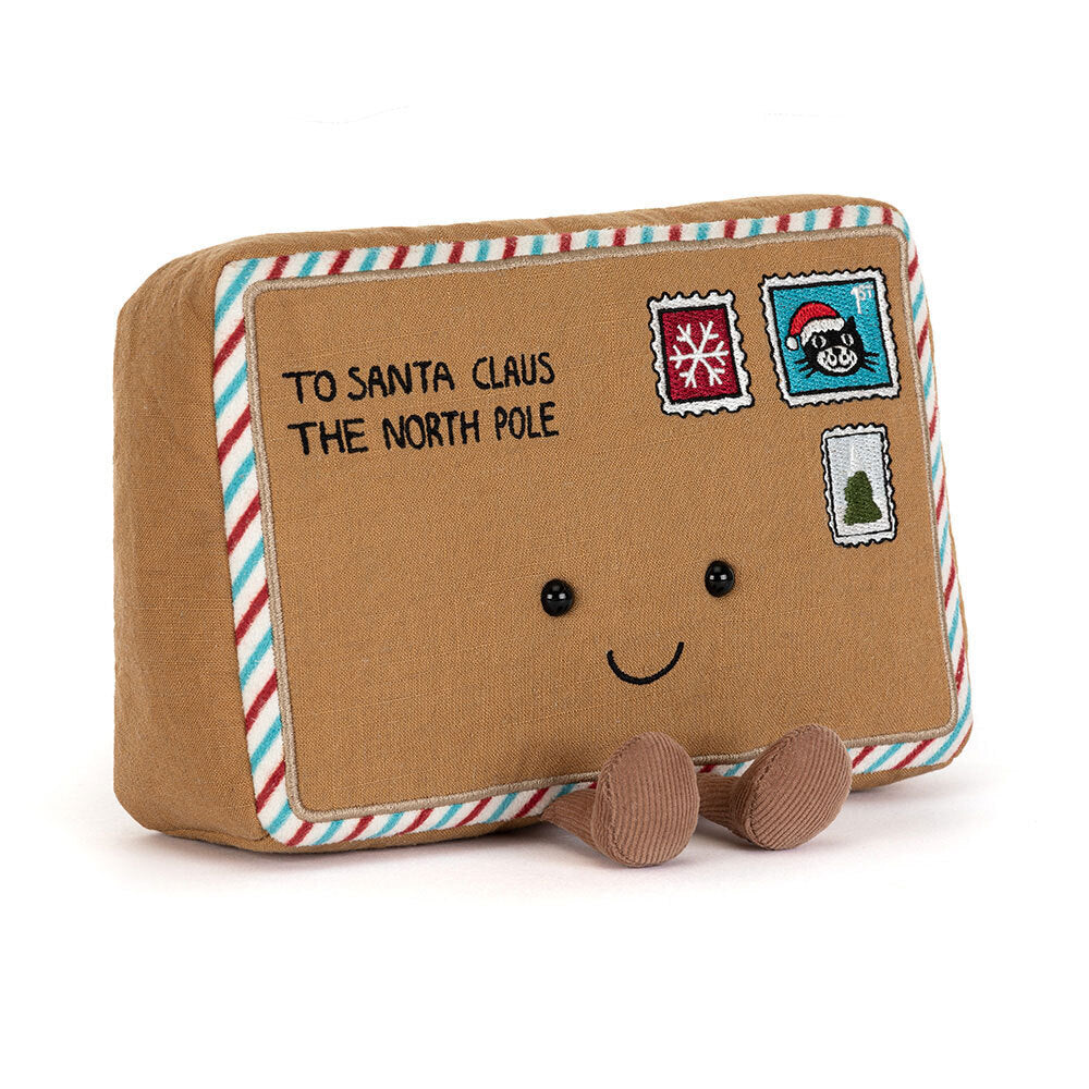 Front view of Jellycat Amuseables Letter To Santa plush toy with stitched face and festive stamps.