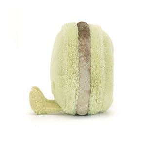 A side angle of the Jellycat Max Macaron plush toy, showcasing the fluffy filling and textured details.