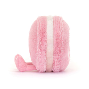 Side profile of the Jellycat Amuseables Mia Macaron plush, showing its compact size and plush form.