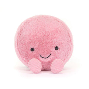 Front view of the Jellycat Amuseables Mia Macaron plush, highlighting its sweet stitched smile and adorable cord feet.