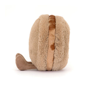 Side profile of Jellycat Amuseables Mona Macaron plush, highlighting the fluffy filling and realistic macaron texture.